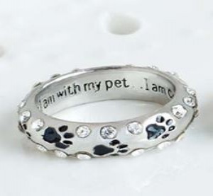 Ring I am complete when I am with my pet 